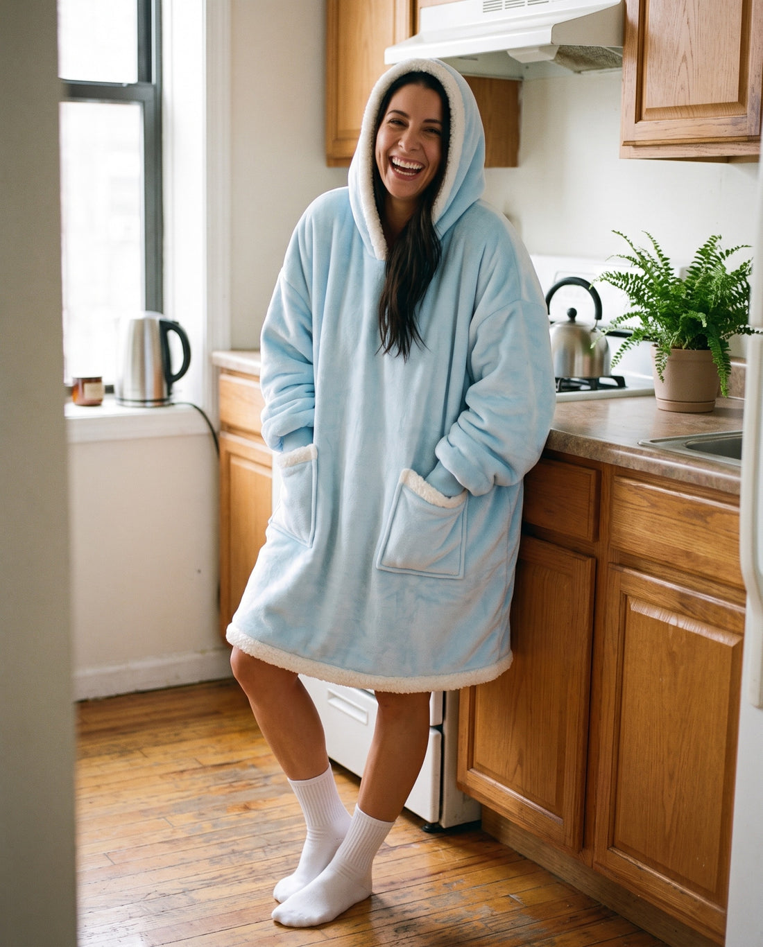 Couchmode Blanket Hoodie in Baby Blue, lifestyle