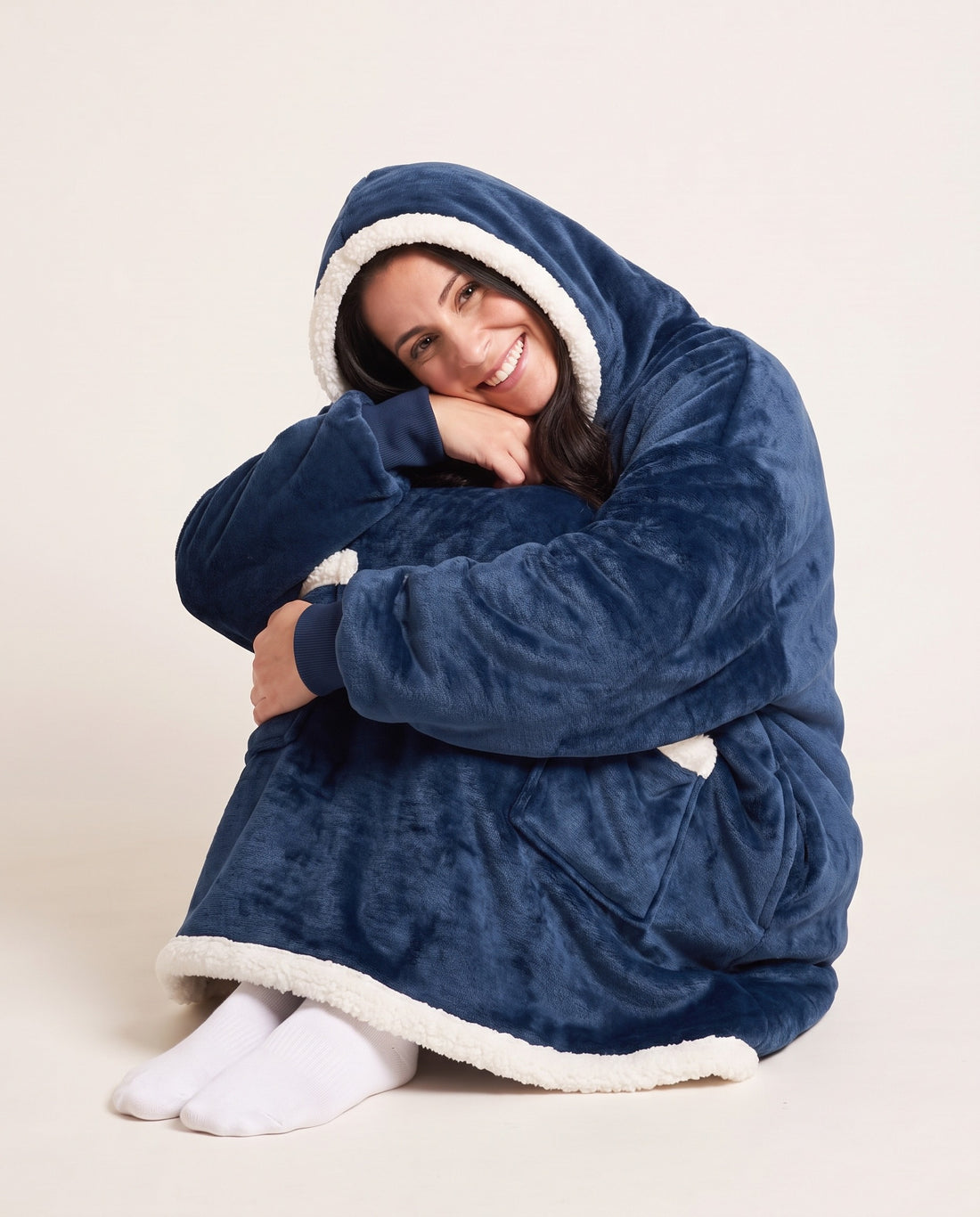 Couchmode Blanket Hoodie in Navy, sitting cozy